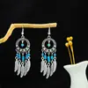 Brincos Étnicos Retrô Transfronteiriços Brincos Longos com Franjas Vermelhas Estilo Boêmio Brincos de Férias em Yunnan Estilo Exótico