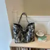 Bolsos Casuales de Gran Capacidad al por Mayor para Mujer 2025 Nuevo Bolso Tote Estampado de Leopardo Bolso de Lona Camuflado de Moda