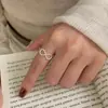 Anillo Abierto de Plata Pura S999 con Diseño de Bola de Arco Calada para Mujer Diseño de Nicho Versátil Simple de Gama Alta para Mujer