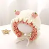 Bonitos y adorables gorros de otoño e invierno para niños, con diseño de poner, material de punto y una serie de dibujos animados, que brindan abrigo y protección para los oídos para bebés y niños pequeños.