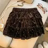 Foto real de la nueva falda de terciopelo de lunares chic coreana de otoño, falda corta versátil y estilizada de línea A, falda juvenil de capas
