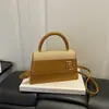 Otoño 2026 Nuevo Bolso de Mano Cuadrado Pequeño de Alto Valor Bolso de Hombro Cruzado Moderno Simple Versátil Bolso para Mujer al por Mayor