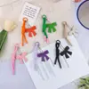 Llavero Colgante Creativo Nuevo Estilo Miu de Cuero con Lazo para Coche, Bolsas y Fundas de Teléfono, Versátil para Parejas