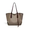Bolsa de Mano 2026 Estilo Nuevo Lona para Mujer Sensación de Alta Gama Gran Capacidad Bolso de Hombro para Viajero Bolso Grande Equipaje