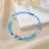 Pulsera tejida de mariposa al por mayor transfronterizo, pulsera de cuentas para parejas y amigos, pulsera de cordón de cera ajustable con mariposa de aleación