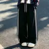 Conjunto de sudadera de hip-hop y pantalones cargo para niñas, nuevo estilo americano de primavera/otoño 2026, camiseta moderna genial, camiseta básica, pantalones de pierna ancha, moderno 8