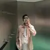 Camisa con cremallera y solapa estilo celebridad de internet de principios de primavera Stone Ston Marca de moda de alta calle europea y americana Chaqueta holgada Unisex