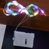 Venta al por mayor de fábrica caja blanca pequeña botón luz led alambre de cobre luz ramo de pastel estrellas bola de onda cadena de luces decorativas