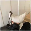Bolso croissant de diseño nicho vintage nuevo para mujer al por mayor transfronterizo, bolso tipo dumpling moderno y de moda, bolso de hombro y bandolera