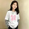 Camiseta de manga larga para niña, nuevo estilo otoño 2026, algodón puro, top a rayas elegante para niños, camiseta básica casual para niños mayores
