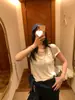 [Nuevo Producto Ms6/28] Camiseta de Lino Versátil con Bordado de Figura en la Espalda y Cuello Redondo para un Look Adelgazante
