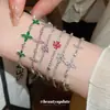 Pulsera Cruzada de Zirconia Mariposa Flor, Pulsera de Lujo Ligero Nicho de Gama Alta, Diseño Versátil, Joyería de Mano Moderna al por Mayor