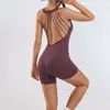 Venta al por mayor transfronteriza de ropa de yoga: Mono deportivo seamless para mujer con almohadillas en el pecho, ropa de fitness Pilates adelgazante, una pieza envío directo