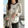 Camiseta de algodón puro con bloques de color y mangas raglán largas para mujer, capa base de otoño, moderna y adelgazante, top interior estampado elegante
