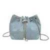 Bolso tipo cubo casual de estilo coreano, nueva colección otoño/invierno 2026, diseño único, moderno bolso cruzado y de mano para mujer