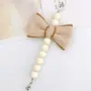 Pulseira com Laço de Pelúcia Acrílica Zhuzi Nova Acessórios de Joalheria para Capa de Celular DIY Laço de Lã de Inverno