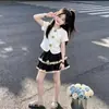 Top de manga corta estilo universitario 2026, moderno y único, falda de encaje dulce tipo pastel, nuevo conjunto de dos piezas de verano para niños mayores