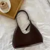Bolso de medialuna tipo baguette Estilo coreano Bolso de nicho para mujer Bolso de hombro único para mujer Bolso de axila elegante simple de moda de alta gama