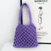 Bolsa de Mão Versátil de Tecido 2026 Primavera/Verão Bolsa Feminina Vazada Nova Tendência Estilo Ins Bolsa de Tricô Bolsa de Praia