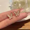 Nuevos pendientes de mariposa de moda 2023 para mujer, aguja de plata 925, diseño de nicho, simples, versátiles, clip para oreja, venta al por mayor