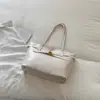 Bolsa de Color Sólido de Gran Capacidad 2026 Otoño Nuevo de Alto Valor Personalidad Casual Bolso Tote Trabajo Trayecto Diario Bolso de Hombro Único