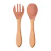 Vajilla de alimentación para niños de grado alimenticio Cuchara para comer bebé Tenedor Silicona Tazón Cuchara Tenedor de silicona para niños Cuchara con mango de madera