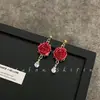 Pendientes de gota de rosa eterna de lujo ligero retro, diseño de nicho, estilo de corte, pendientes elegantes para el corazón de las chicas, joyería