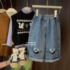 Pantalones vaqueros de estilo occidental para niñas, de primavera y otoño, con personalidad infantil, estilo coreano moderno, con dibujos animados rotos, para celebrar Internet, de moda y pierna ancha.