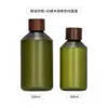 Em estoque garrafa de ombro oblíquo 300ml tampa de madeira com cera branca garrafa de água de rosas pura 500ml pet frasco para cosméticos emulsão tônico sub-embalado