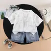 Ropa de Verano para Bebés y Niños Conjunto Infantil 2026 Ropa Nueva y Elegante Niños Estampado Completo de Letras Conjunto de Dos Piezas de Manga Corta