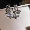 Pendientes Retro Franceses de Flor de Circonita en Forma de C, Pendientes Exquisitos y Elegantes con un Toque de Lujo Ligero y Alta Gama, Venta al por Mayor