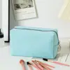Nuevo Bolso de Maquillaje Seersucker de Venta Caliente Transfronterizo, Neceser de Gran Capacidad, Bolsa de Almacenamiento de Viaje Rayada, Bolso de Mano de Color Sólido