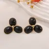 Pendientes Transfronterizos Europeos y Americanos de Ojo de Tigre Maillard para Mujer Pendientes de Suéter de Invierno Franceses de Nicho Pendientes de Moda de Alta Gama