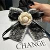 2023 novo estilo Chanel Camélia faixa de cabelo Arco intestino grosso anel all-match corda de cabelo tecido feminino corda de cabelo acessórios para cabelo