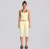 Conjunto de yoga transfronteiriço para mulheres, regata esportiva com blocos de cor, estilo duas peças falsas, conjunto casual para corrida, treino e fitness