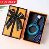 Chaveiro de anel de aperto criativo transfronteiriço para alívio de estresse, mini treinador de dedos colorido, dispositivo de aperto para alívio de estresse, pingente de mochila