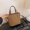 2025 Nova Bolsa Feminina Transfronteiriça Bolsa Saco de Alta Qualidade Moda Feminina Versátil Cesta de Vegetais Bolsa de Ombro Transversal para Presbiópicos