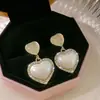 Pendientes de Ojo de Gato de Perla para Mujer 2024 Nuevos Tendencia Diseño de Nicho Lujo Ligero Pendientes Elegantes de Alta Calidad