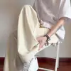 Pantalones de seda helada para hombre, marca casual de moda, tacto frío, secado rápido, corte holgado, pantalones de pierna ancha texturizados de verano, pantalones rectos finos