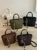 Bolso de Mujer 2026 Primavera Nuevo Bolso de Cuero PU de Gran Capacidad Bolso de Hombro y Mano para Mujer Bolso Tote de Gama Alta de Nicho para Viajes