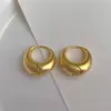 Pendientes ovalados geométricos de oro mate cepillado, diseño de nicho, alta gama, lujo ligero, temperamento, versátiles, simples, para el día a día, modernos