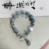 Pulseiras de Cerâmica de Jingdezhen com Alto Valor Estético, Atacado para Barracas, Design de Nicho, Joias Versáteis e Populares com Contas de Cerâmica em Formato de Folha de Ginkgo