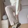 Pantalones anchos forrados de forro polar para mujer de otoño e invierno, pantalones de lana de cintura alta, pantalones rectos de pierna estrecha con patrón de espiga en el dobladillo dividido engrosado para invierno
