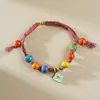 Accesorios Pequeños Más Vendidos para Puestos de Año Nuevo, Pulseras de Cerámica con Hilo Rojo, Cuerdas para la Mano, Joyería, Cuerdas para la Mano del Festival de Primavera, Venta al Por Mayor Directamente del Fabricante