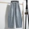 Foto real de pantalones de trabajo estilo americano, jeans curvos de corte holgado, pantalones anchos vintage lavados unisex, pantalones finos de marca versátiles y modernos nuevos