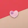 Venta al por mayor de fábrica, accesorios de joyería de resina con cara sonriente y corazón, pasador de pelo de dibujos animados, parche, decoración de caja de almacenamiento para tazas