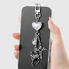 Dulce y Personalizado Exquisito Perla de Imitación Corazón Calado Estrella Alas de Araña Cruz Fresa Lazo Llavero