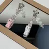 Flocagem de resina fofa tridimensional colorida roupas gato chaveiro pingente chaveiro de carro pingente de bolsa atacado