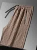 Pantalones deportivos a cuadros de verano, pantalones casuales de moda, pantalones de cinco puntos de marca de moda, pantalones rectos nuevos y populares para hombres jóvenes