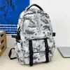 Mochila de Camuflaje para Hombres y Mujeres, Gran Capacidad, Moderna, Ligera, Mochila Casual de Viaje, Bolso Escolar Estudiante de Moda y Versátil